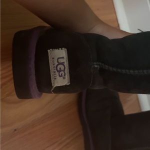 Black uggs with purple and pink trimming